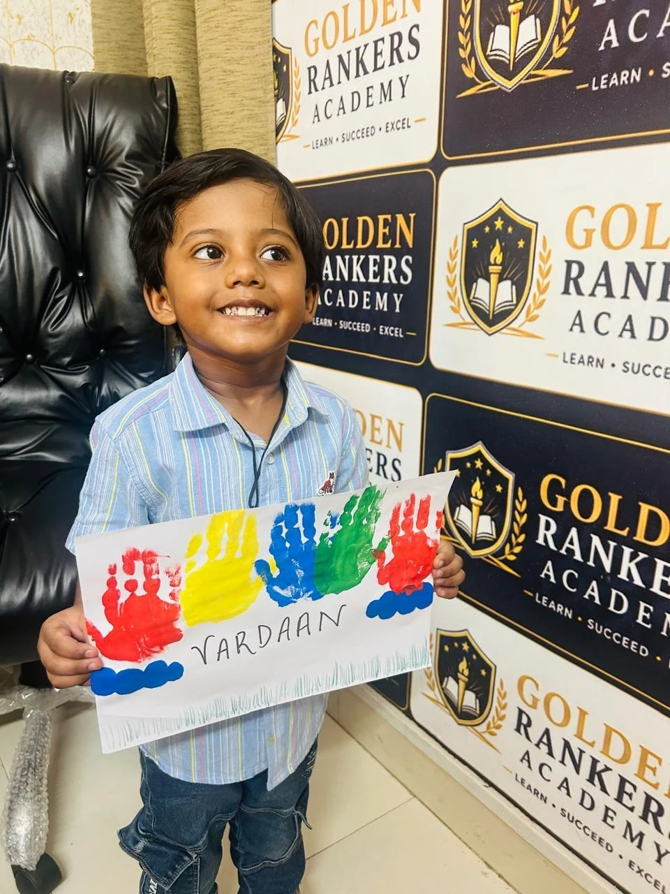 Young student with art work
